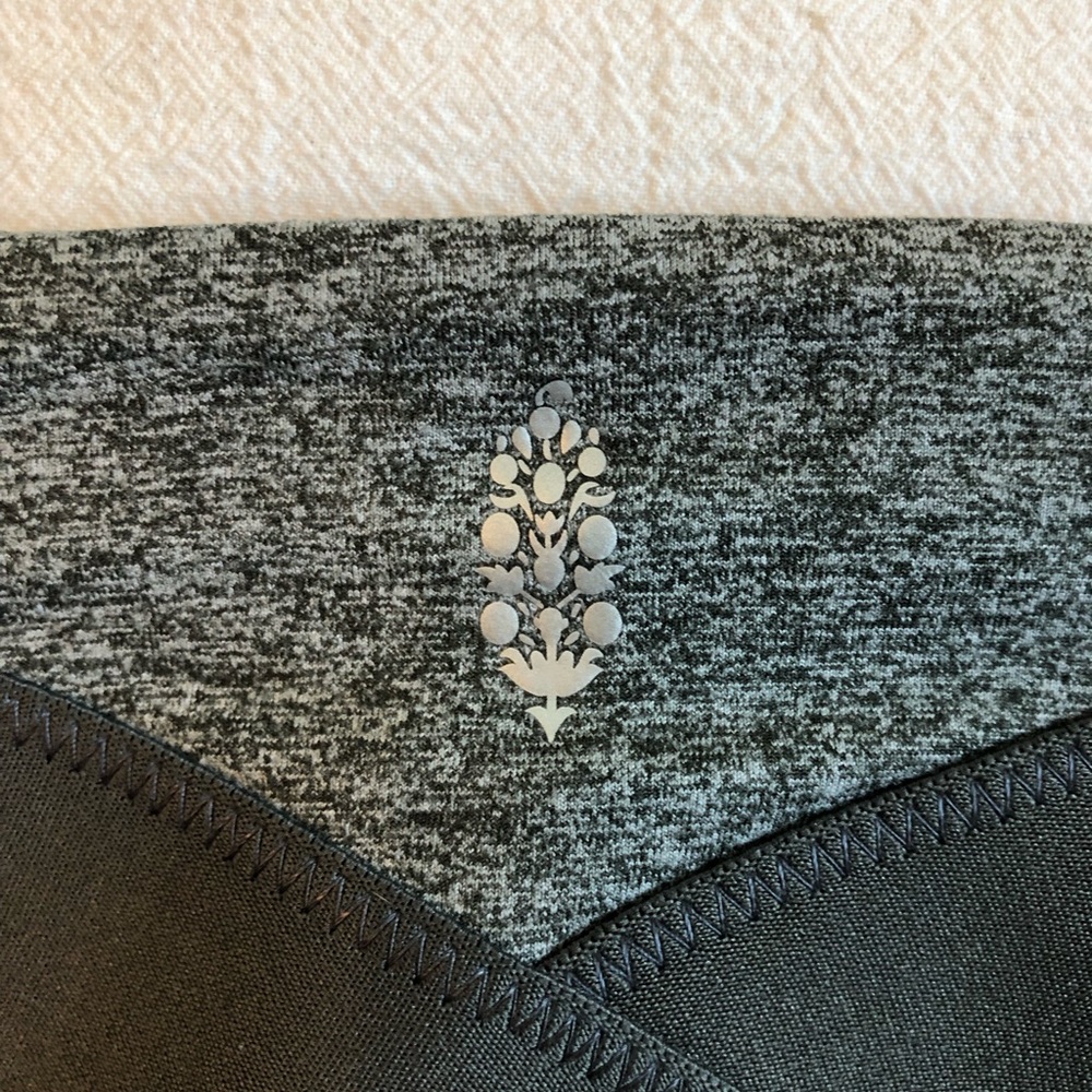 Free People Movement High Waisted Leggings with pockets on legs and waist